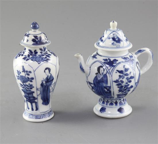 A Chinese blue and white vase and cover and a similar wine pot and cover, Kangxi period, height 12cm,